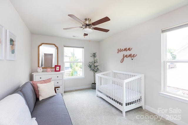 5907 Barrowlands Ct, Charlotte, NC 28210 - bedroom with light colored carpet and ceiling fan
