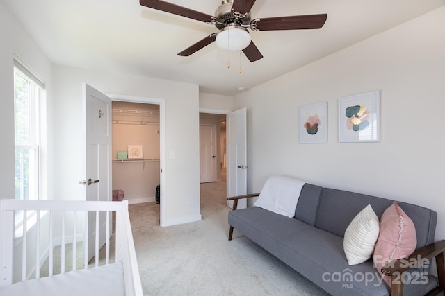 5907 Barrowlands Ct, Charlotte, NC 28210 - bedroom with light colored carpet, a walk in closet, and ceiling fan