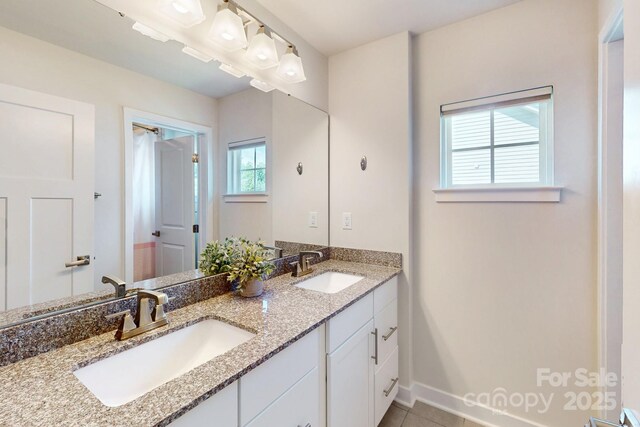 5907 Barrowlands Ct, Charlotte, NC 28210 - bathroom featuring double vanity and tile patterned floors
