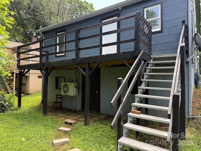 703 Stage St NW, Lenoir, NC 28645 - back of house featuring stairway, a deck, and a yard