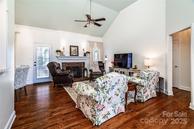 2218 Wednesbury Ct, Kannapolis, NC 28083 - living room featuring healthy amount of natural light, ceiling fan, high vaulted ceiling, a fireplace, and wood finished floors