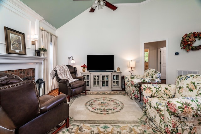 2218 Wednesbury Ct, Kannapolis, NC 28083 - living room with crown molding, plenty of natural light, ceiling fan, a brick fireplace, and high vaulted ceiling