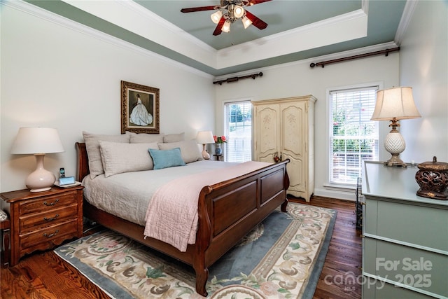 2218 Wednesbury Ct, Kannapolis, NC 28083 - bedroom featuring multiple windows, dark wood-style flooring, crown molding, and a raised ceiling