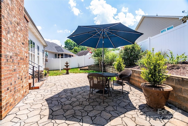 2218 Wednesbury Ct, Kannapolis, NC 28083 - fenced backyard with a patio area and outdoor dining area