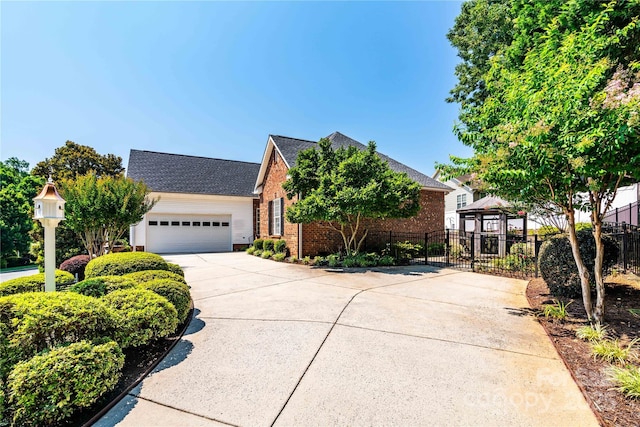 2218 Wednesbury Ct, Kannapolis, NC 28083 - view of front of home with brick siding, driveway, a garage, and roof with shingles