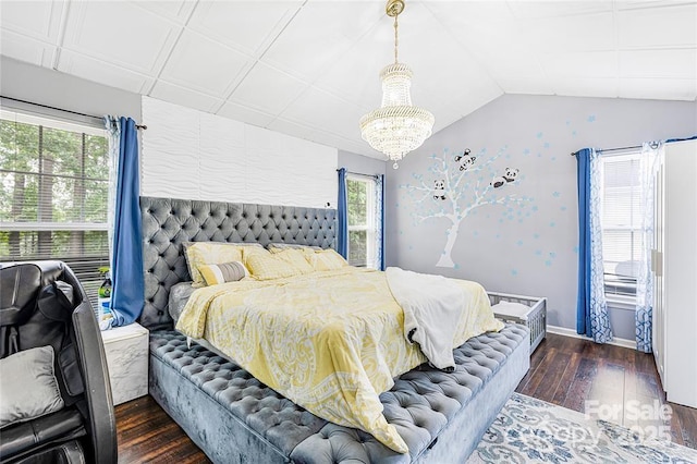 9910 Sandman Ln, Charlotte, NC 28216 - bedroom with wood finished floors, a chandelier, and vaulted ceiling
