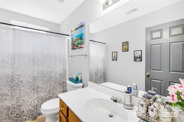 9910 Sandman Ln, Charlotte, NC 28216 - bathroom featuring vanity and a shower with curtain