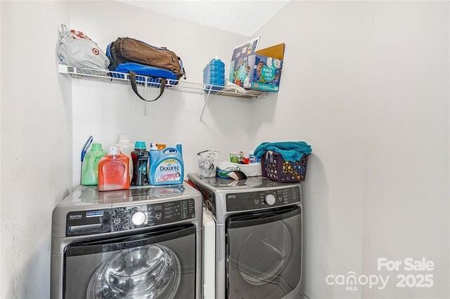 9910 Sandman Ln, Charlotte, NC 28216 - washroom featuring washer and clothes dryer