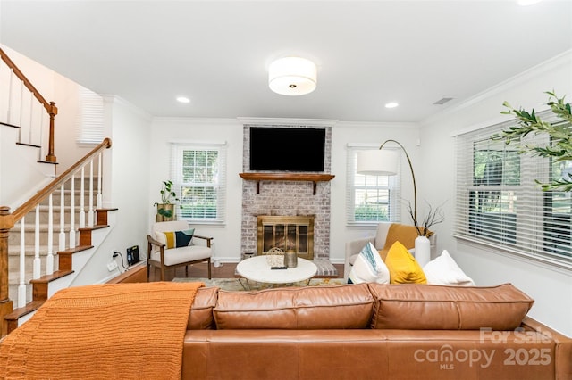 3106 Windstream Ct, Charlotte, NC 28210 - living room featuring stairs, plenty of natural light, a fireplace, crown molding, and recessed lighting