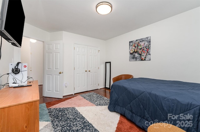 3106 Windstream Ct, Charlotte, NC 28210 - bedroom with wood finished floors and a closet