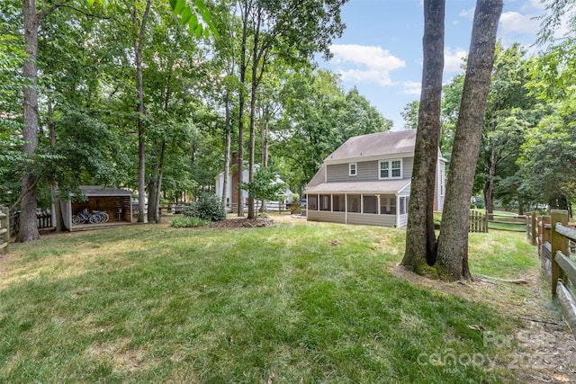 3106 Windstream Ct, Charlotte, NC 28210 - view of yard featuring a sunroom and an outdoor structure