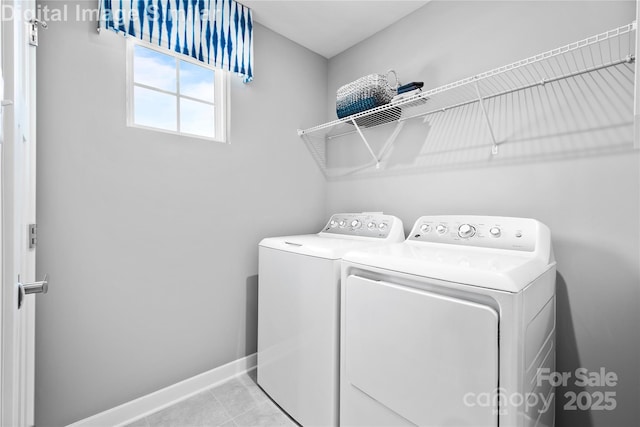 7319 Childress Dr SW, Concord, NC 28025 - laundry area featuring washing machine and clothes dryer and tile patterned floors