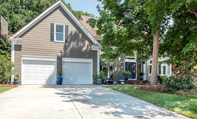 10711 Spring Camp Way, Charlotte, NC 28277 - view of front facade featuring driveway and a garage