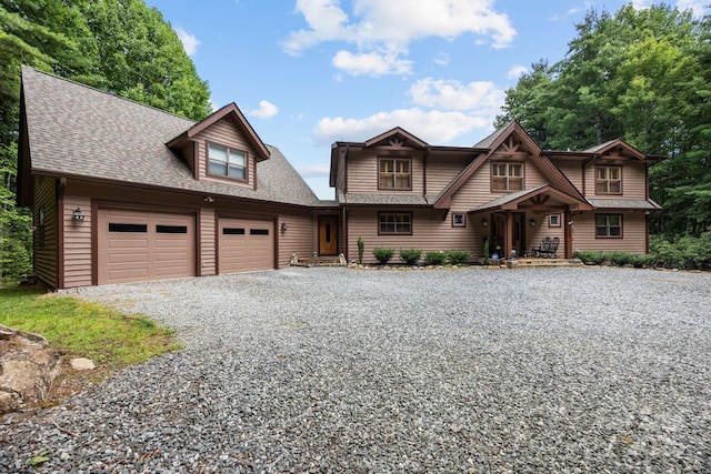 266 Lost Mine Trl Unit 602, Brevard, NC 28712 - view of front facade with driveway, an attached garage, and a shingled roof