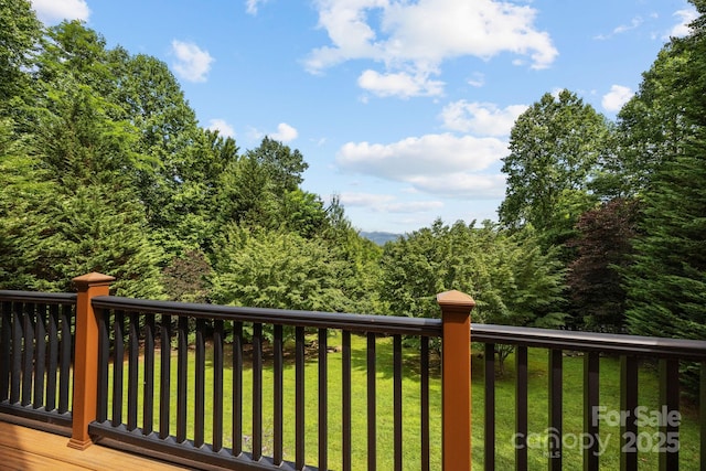 266 Lost Mine Trl Unit 602, Brevard, NC 28712 - wooden terrace featuring a lawn