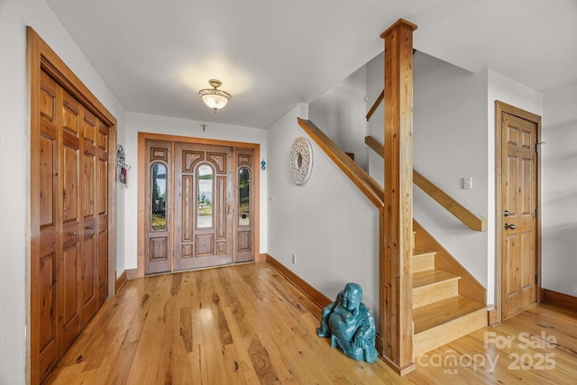 266 Lost Mine Trl Unit 602, Brevard, NC 28712 - entryway with stairway and light wood-style flooring