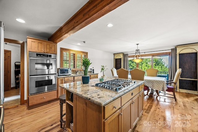 266 Lost Mine Trl Unit 602, Brevard, NC 28712 - kitchen featuring plenty of natural light, stainless steel appliances, a kitchen island, light wood finished floors, and recessed lighting