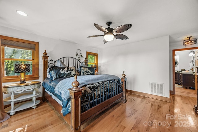 266 Lost Mine Trl Unit 602, Brevard, NC 28712 - bedroom featuring wood finished floors, a ceiling fan, and recessed lighting