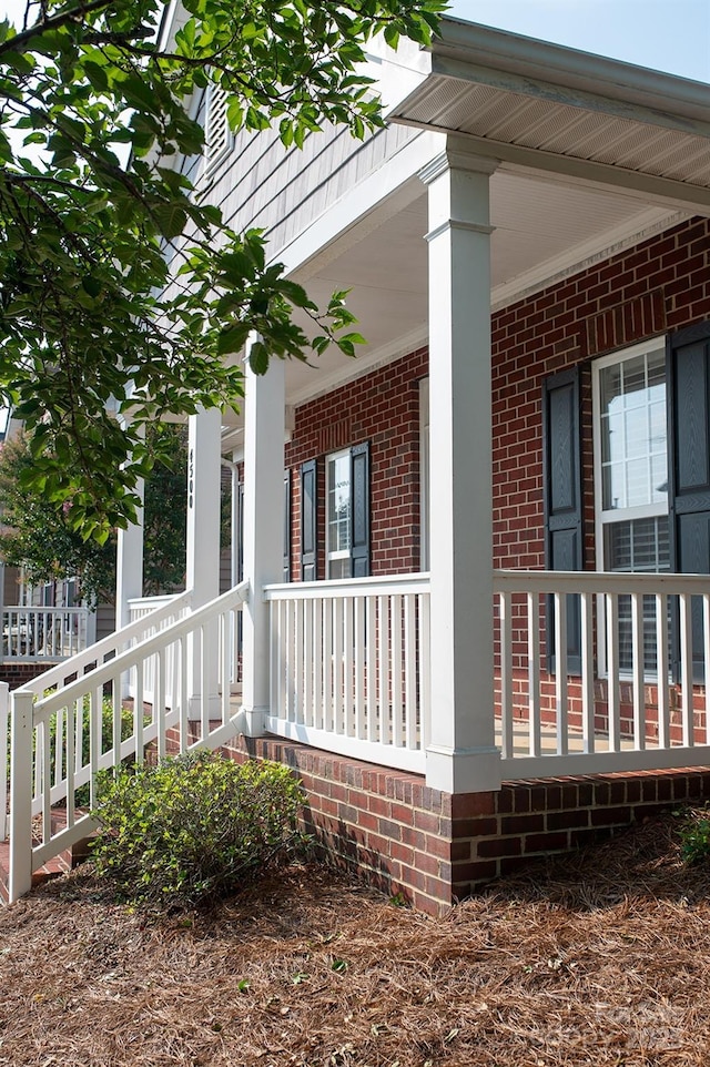 4500 Sages Ave, Indian Trail, NC 28079 - view of side of home with brick siding and a porch