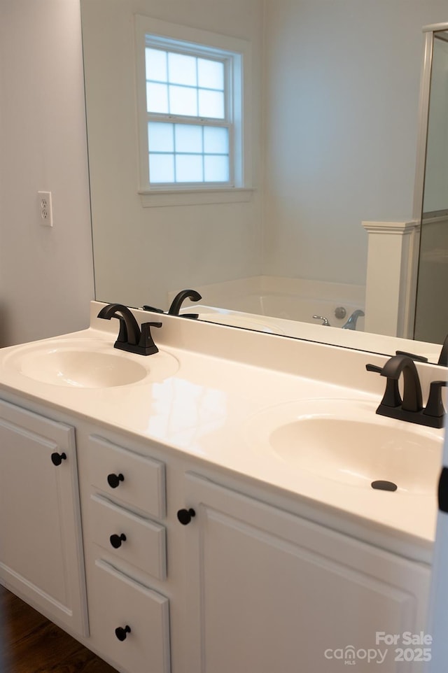 4500 Sages Ave, Indian Trail, NC 28079 - bathroom featuring double vanity, a bath, and an enclosed shower