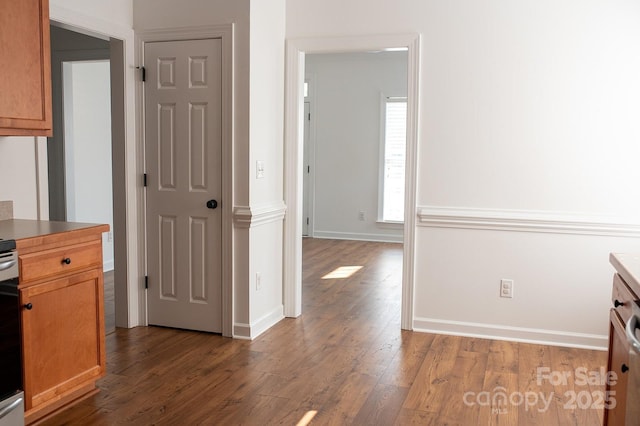 4500 Sages Ave, Indian Trail, NC 28079 - kitchen featuring dark wood-style floors and baseboards