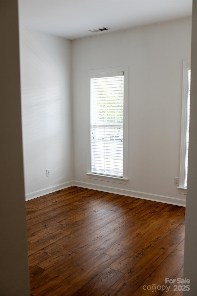 4500 Sages Ave, Indian Trail, NC 28079 - empty room featuring dark wood-style floors and baseboards