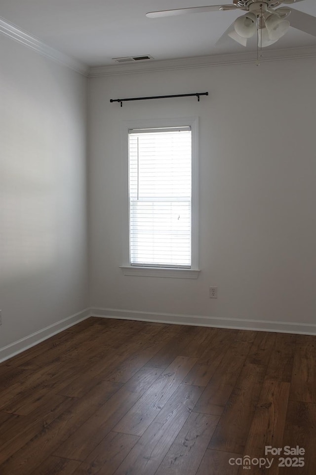 4500 Sages Ave, Indian Trail, NC 28079 - unfurnished room with ornamental molding, dark wood-type flooring, and a ceiling fan