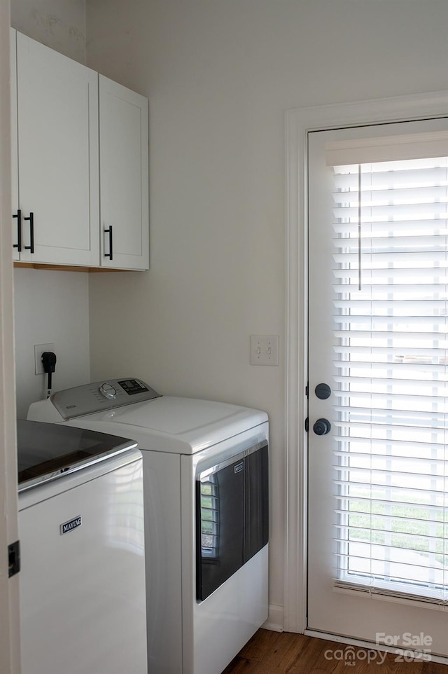 4500 Sages Ave, Indian Trail, NC 28079 - washroom with separate washer and dryer, cabinet space, and wood finished floors