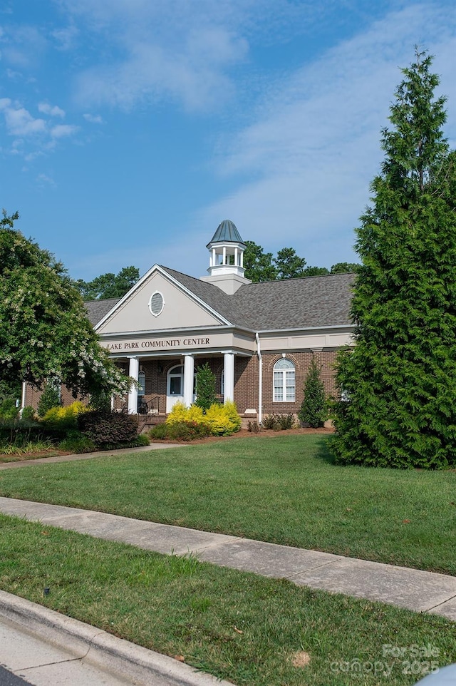 4500 Sages Ave, Indian Trail, NC 28079 - view of front of property featuring a front lawn, brick siding, and a shingled roof