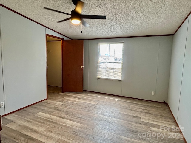 2268 Arrowwood Dr, Hickory, NC 28601 - empty room with light wood finished floors, ceiling fan, ornamental molding, and a textured ceiling