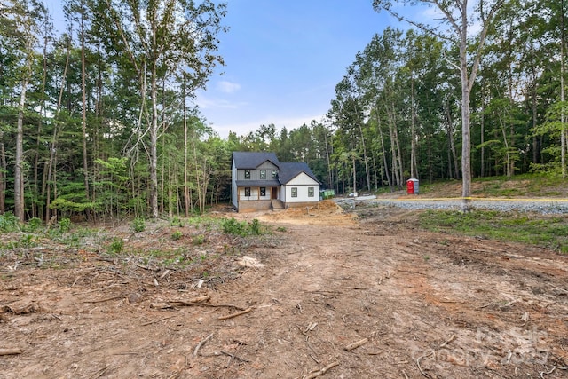 4641 Yellow Poplar Ln, Concord, NC 28025 - view of front of house with a forest view