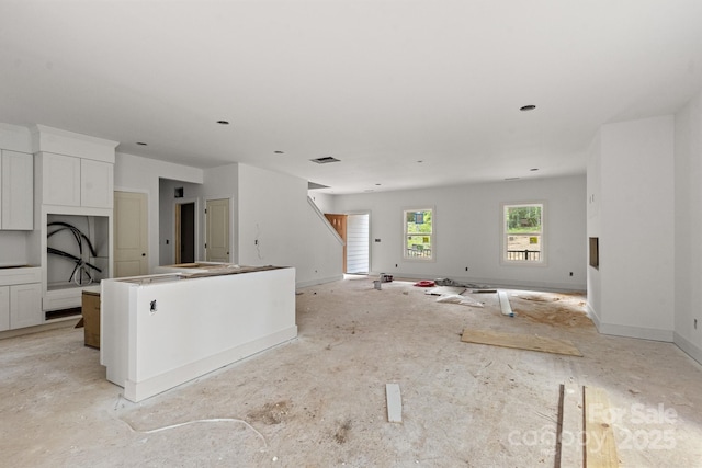 4641 Yellow Poplar Ln, Concord, NC 28025 - unfurnished living room featuring baseboards
