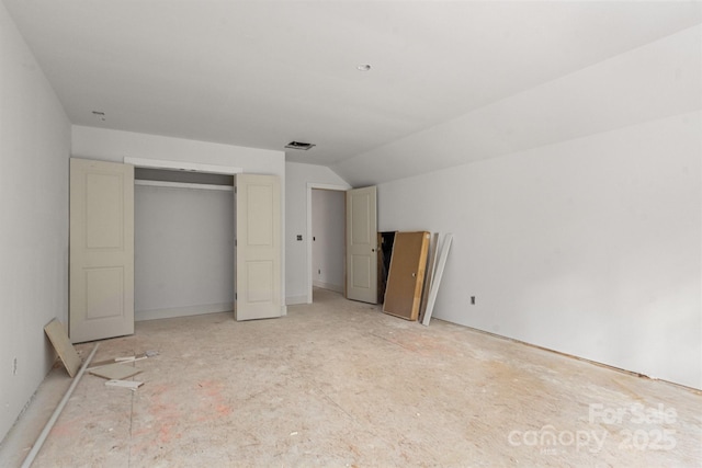 4641 Yellow Poplar Ln, Concord, NC 28025 - unfurnished bedroom featuring lofted ceiling and a closet