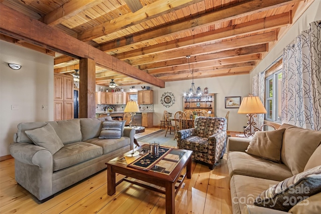 747 Bear Cove Cir, Bryson City, NC 28713 - living room featuring light wood-style flooring, a wood ceiling with exposed beams, and a chandelier