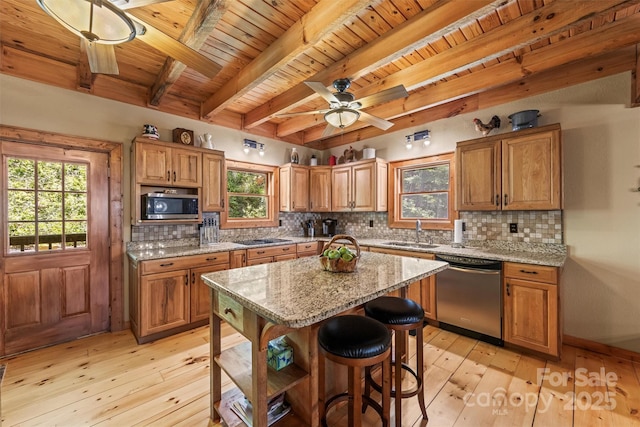 747 Bear Cove Cir, Bryson City, NC 28713 - kitchen with stainless steel appliances, a wood ceiling with exposed beams, light wood finished floors, backsplash, and light stone countertops
