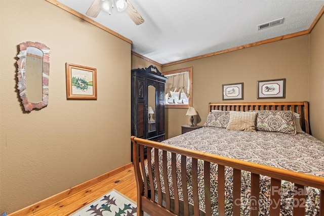 747 Bear Cove Cir, Bryson City, NC 28713 - bedroom featuring a ceiling fan and ornamental molding