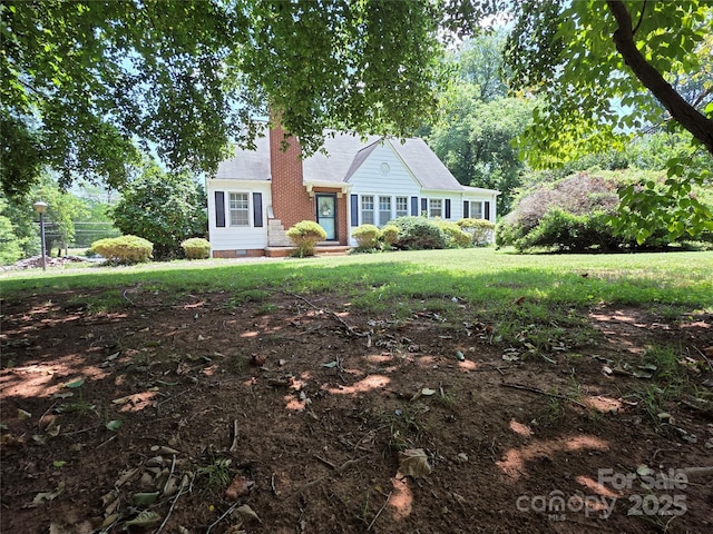7335 US Highway 52, Salisbury, NC 28146 - view of front facade with a chimney and a front lawn
