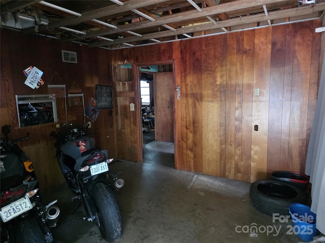 7335 US Highway 52, Salisbury, NC 28146 - misc room featuring wooden walls and concrete flooring