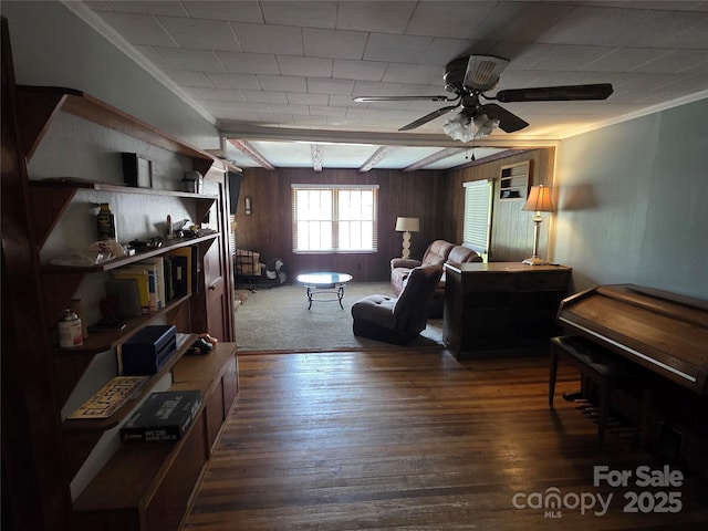7335 US Highway 52, Salisbury, NC 28146 - living area with ceiling fan, crown molding, wood walls, and hardwood / wood-style floors