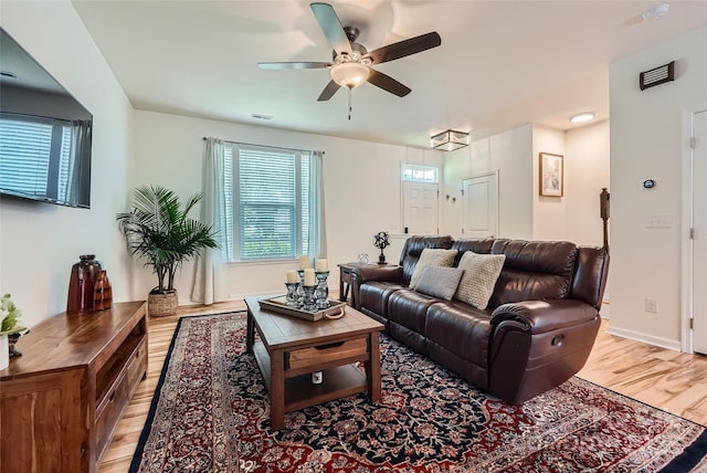1727 Evergreen Dr, Charlotte, NC 28208 - living area featuring light wood-type flooring and ceiling fan