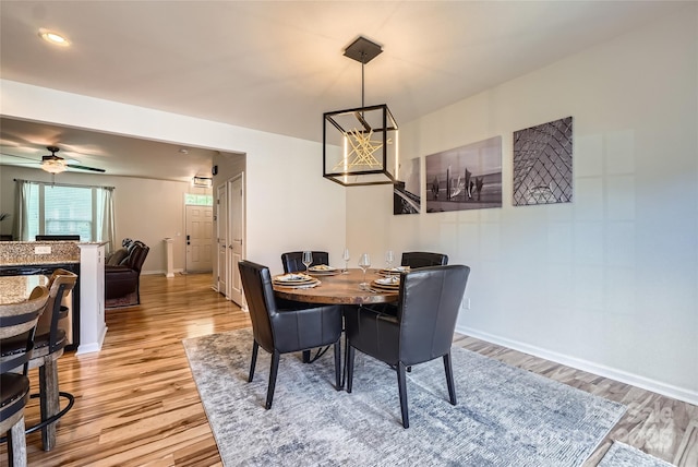 1727 Evergreen Dr, Charlotte, NC 28208 - dining area with light wood-type flooring and ceiling fan