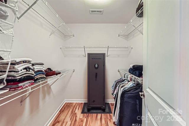 1727 Evergreen Dr, Charlotte, NC 28208 - walk in closet featuring light wood-style flooring