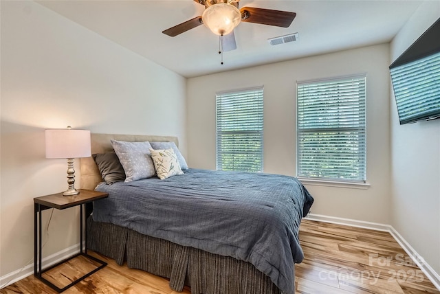 1727 Evergreen Dr, Charlotte, NC 28208 - bedroom featuring wood finished floors and a ceiling fan