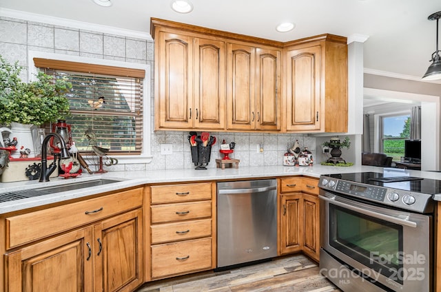 4710 Mooresville Rd, Salisbury, NC 28147 - kitchen with stainless steel appliances, ornamental molding, light countertops, light wood-type flooring, and tasteful backsplash