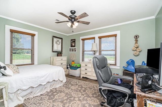 4710 Mooresville Rd, Salisbury, NC 28147 - bedroom featuring ornamental molding, wood finished floors, an office area, and a ceiling fan