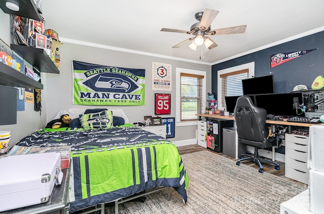 4710 Mooresville Rd, Salisbury, NC 28147 - bedroom featuring ornamental molding, an office area, wood finished floors, and a ceiling fan