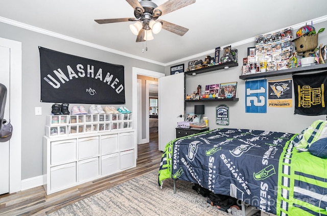 4710 Mooresville Rd, Salisbury, NC 28147 - bedroom with crown molding, wood finished floors, and a ceiling fan