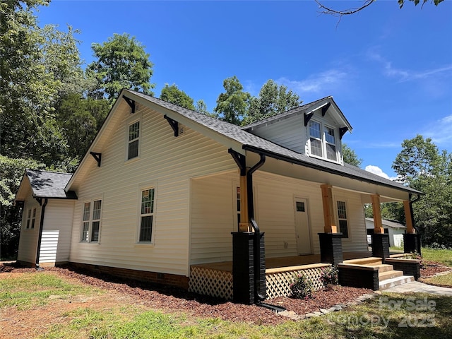 1805 Swan Dr SW, Lenoir, NC 28645 - view of home's exterior featuring covered porch, crawl space, and roof with shingles