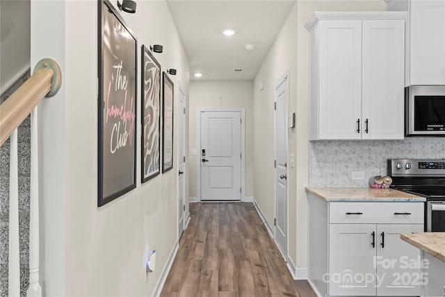 3740 Backwater St, Concord, NC 28027 - hall featuring dark wood finished floors and recessed lighting