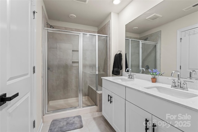 3740 Backwater St, Concord, NC 28027 - bathroom featuring double vanity, a stall shower, and tile patterned flooring